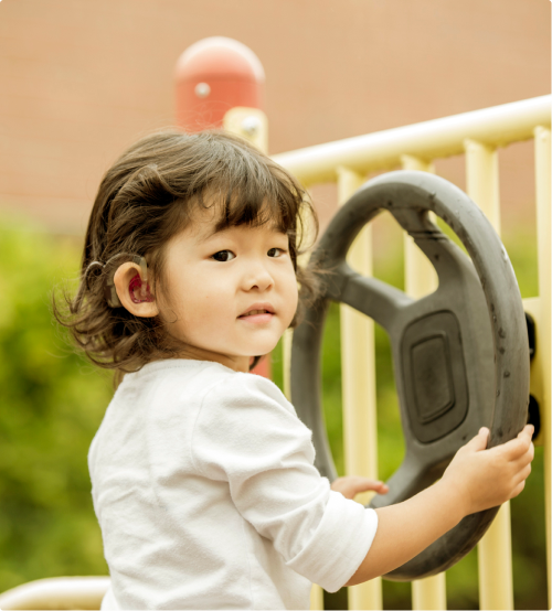 Toddler playing at a playground